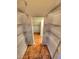 Walk-in closet with a lot of storage space and wired shelving units at 29916 Cedar Waxwing Dr, Wesley Chapel, FL 33545