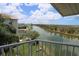 Relaxing view from balcony showcasing water views with nearby docks and green space at 3402 Amberjack Dr, Hernando Beach, FL 34607
