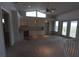 Bright bedroom with built in desk and shelving plus access to a private balcony at 3402 Amberjack Dr, Hernando Beach, FL 34607