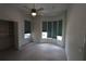 Bedroom featuring a ceiling fan, built-in closet, and window with blinds for natural light at 3402 Amberjack Dr, Hernando Beach, FL 34607