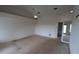 Large bedroom with a ceiling fan and a walk-in closet, offering comfort and ample storage space at 3402 Amberjack Dr, Hernando Beach, FL 34607