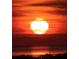 Vibrant sunset over the ocean at 3402 Amberjack Dr, Hernando Beach, FL 34607