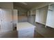 Walk-in closet with lots of shelving and an island organizer at 3402 Amberjack Dr, Hernando Beach, FL 34607