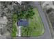 Birds-eye view of home showcasing the property's boundaries and mature landscaping at 34819 Hibiscus Dr, Dade City, FL 33523