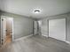 Spacious bedroom featuring fresh paint, a closet, and an ensuite bathroom at 34819 Hibiscus Dr, Dade City, FL 33523