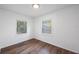 Bright bedroom featuring two windows that offer ample natural light at 3544 6Th S Ave, St Petersburg, FL 33711