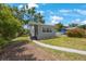 Cozy home with a well-kept front yard, enhanced by a sidewalk that leads to the front entrance at 3544 6Th S Ave, St Petersburg, FL 33711