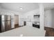 Bright kitchen with stainless steel appliances, white cabinets, and granite counters at 3544 6Th S Ave, St Petersburg, FL 33711
