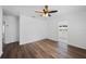 Spacious living room features a ceiling fan and access to adjacent rooms at 3544 6Th S Ave, St Petersburg, FL 33711