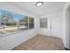 Sunroom with tile flooring, and plenty of natural light from exterior view at 3544 6Th S Ave, St Petersburg, FL 33711