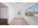 Bright sunroom with tile floor, lots of windows, and view of outdoors at 3544 6Th S Ave, St Petersburg, FL 33711