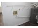 Laundry room featuring a water heater and shelving at 38668 Ferm Cir, Zephyrhills, FL 33540