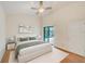 Serene bedroom with a relaxing view of the pool area, creating a private and peaceful retreat at 4008 Moreland Dr, Valrico, FL 33596
