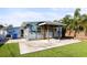 Charming home featuring a covered patio, patio, and fenced-in backyard at 487 49Th N Ave, St Petersburg, FL 33703