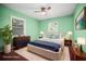Bedroom with a queen bed and decor at 487 49Th N Ave, St Petersburg, FL 33703