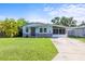 Charming single-Gathering home with a well-maintained lawn and inviting front exterior, perfect for comfortable living at 487 49Th N Ave, St Petersburg, FL 33703
