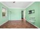 Spacious living room features tile floors, natural light, and neutral walls at 487 49Th N Ave, St Petersburg, FL 33703
