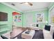 Living room features lots of seating, natural light, and tile floors at 487 49Th N Ave, St Petersburg, FL 33703