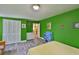 Bedroom featuring hardwood floors, natural light, closet, and access to other rooms at 5840 39Th N St, St Petersburg, FL 33714