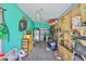 Spacious garage with ample storage, shelving, refrigerator, and workspace at 5840 39Th N St, St Petersburg, FL 33714