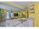The Kitchen has granite countertops and offers an amazing view of the living room and backyard at 5840 39Th N St, St Petersburg, FL 33714