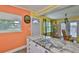 Close up of the granite countertops with kitchen with a view of the kitchen door and the living room at 5840 39Th N St, St Petersburg, FL 33714