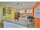 Bright kitchen featuring granite countertops, stainless steel appliances, and white cabinetry, ready for culinary adventures at 5840 39Th N St, St Petersburg, FL 33714