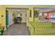 Bright living room featuring an open floor plan to the kitchen and an adjacent home office area at 5840 39Th N St, St Petersburg, FL 33714