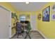 A dedicated home office space with colorful walls and natural light, perfect for productivity at 5840 39Th N St, St Petersburg, FL 33714