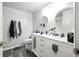 Bright bathroom featuring a double sink vanity with marble countertop and brushed nickel hardware at 603 Bainbridge Dr, Brandon, FL 33511