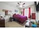 Cozy bedroom featuring a ceiling fan, natural light, and a comfortable layout for relaxation at 603 Bainbridge Dr, Brandon, FL 33511