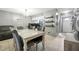 Comfortable dining space showcases a modern table set adjacent to the kitchen and living area at 603 Bainbridge Dr, Brandon, FL 33511