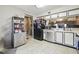 Well-lit kitchen with tiled floor, essential appliances, and convenient access to other living spaces at 603 Bainbridge Dr, Brandon, FL 33511
