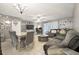 Spacious living room featuring a dining area, ceiling fan, and sliding glass door for natural light at 603 Bainbridge Dr, Brandon, FL 33511