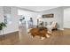 Spacious living area featuring hardwood floors, modern furnishings, and ample space for entertaining at 610 Cordova Ne Blvd, St Petersburg, FL 33704
