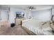 Spacious main bedroom featuring hardwood floors, ceiling fan, and bright natural light at 636 Olive Conch St, Ruskin, FL 33570