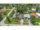 Aerial view of the neighborhood showcasing the house, landscaping, and surrounding community at 6704 70Th N Ave, Pinellas Park, FL 33781