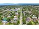 Neighborhood aerial view showcasing quiet residential streets lined with lush trees in a suburban area at 6704 70Th N Ave, Pinellas Park, FL 33781
