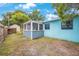 Exterior view of a screened-in porch and backyard at 6704 70Th N Ave, Pinellas Park, FL 33781