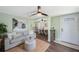Cozy living area with comfortable seating, open to a dining area and modern decor at 6704 70Th N Ave, Pinellas Park, FL 33781