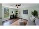 Inviting living room featuring trendy furniture, stylish decor, and lots of natural light at 6704 70Th N Ave, Pinellas Park, FL 33781