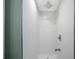 Contemporary shower with white tile and modern fixtures at 6704 70Th N Ave, Pinellas Park, FL 33781