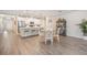 Open floor plan showcases a kitchen with a center island and a spacious dining area at 6879 Talamore Dr, Wesley Chapel, FL 33545