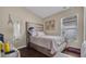 Bright bedroom with bed, vanity, and window at 7120 Forest Mere Dr, Riverview, FL 33578