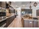 Spacious kitchen showcases a large island, stainless steel appliances, and custom cabinetry at 7162 Graybrook Dr, Wesley Chapel, FL 33545