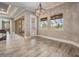 Bright living area with large windows, a sliding glass door, and neutral color palette at 7162 Graybrook Dr, Wesley Chapel, FL 33545
