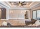Cozy living room with a comfortable sofa, recessed lighting, and a ceiling fan at 7162 Graybrook Dr, Wesley Chapel, FL 33545
