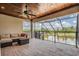 Entertain in style in this screened patio offering beautiful backyard views and ample seating at 7162 Graybrook Dr, Wesley Chapel, FL 33545