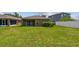 Expansive backyard showing ample space and privacy, with fencing at 8020 Carriage Pointe Dr, Gibsonton, FL 33534