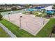 Full basketball court with recreational facilities and nearby swimming pool in the Gathering-friendly community at 8020 Carriage Pointe Dr, Gibsonton, FL 33534